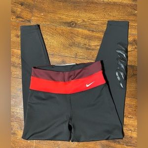 Women’s Nike Leggings. Black with red/maroon waistband. Size small.